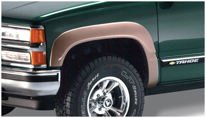 Bushwacker 97-99 Chevy Tahoe OE Style Flares 4pc 4-Door Only - Black