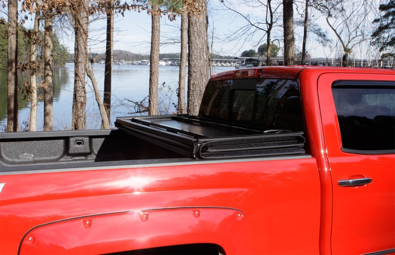 Lund 15-18 Ford F-150 Styleside (6.5ft. Bed) Hard Fold Tonneau Cover - Black