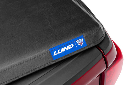 Lund 05-15 Toyota Tacoma Fleetside (6ft. Bed) Hard Fold Tonneau Cover - Black