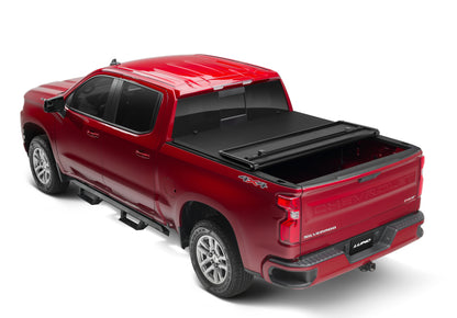 Lund 05-17 Nissan Frontier Styleside (5ft. Bed) Hard Fold Tonneau Cover - Black
