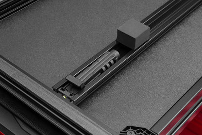 Lund 02-17 Dodge Ram 1500 Fleetside (8ft. Bed) Hard Fold Tonneau Cover - Black